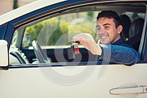 Buyer sitting in his new vehicle, auto purchase, rental business concept