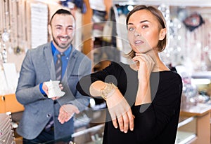 buyer woman choosing bracelet