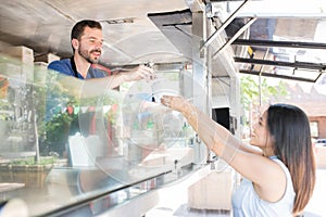 Buying food in a food truck