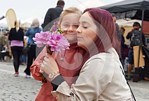 Buying fresh flowers at farmers market in Prague