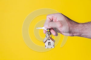 Buying a house. The buyer receives the key to the property.