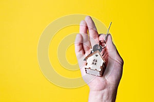 Buying a house. The buyer receives the key to the property.