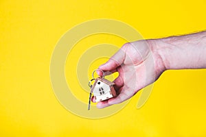 Buying a house. The buyer receives the key to the property.