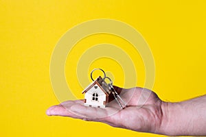 Buying a house. The buyer receives the key to the property.