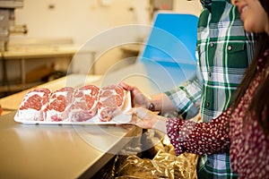Buying meat at a supermarket