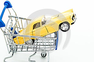 buying new car concept toy car in Shopping Cart roll