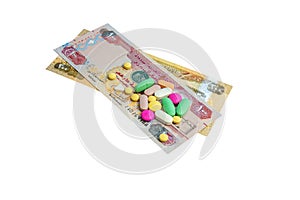 Buying painkillers with a United Arab Emirate dirhams isolated on white background