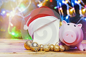 Buying, shopping Xmas gifts, presents. Depositing money for Xmas holidays. Seasonal winter festive spendings concept. Piggybank,