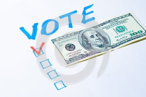 Buying votes of voters concept. Vote, dollars on a white background