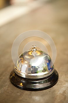 Buzzer or bell on front desk in hotel photo