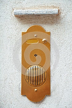 Buzzer on a white wall
