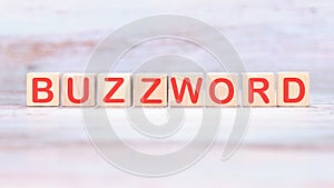 Buzzword word made of wooden cubes on a light background