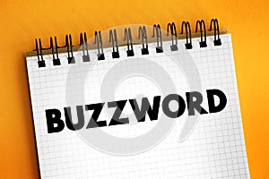 Buzzword - word or phrase, that becomes popular for a period of time, text concept on notepad