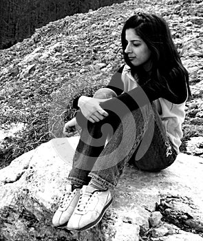 BW Girl sitting on the rock