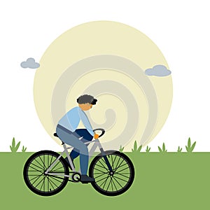 Byciclist on the park with green grass and big sun