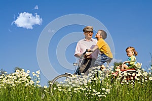 Bycycle ride with grandpa in the spring photo