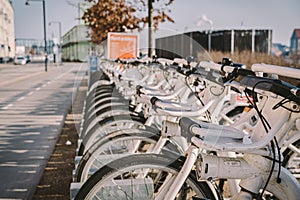 Bycyklen. Electric rental bikes in Copenhagen. row of Bycyklen bicycles. Public electric bikes for rent parked in Copenhagen,