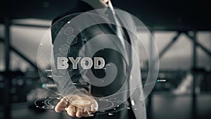 BYOD with hologram businessman concept