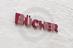 Bücher (Books) Sign on a Building Wall