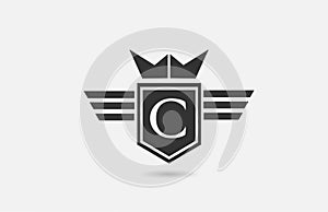 C alphabet letter logo icon for company in black and white. Creative badge design with king crown wings and shield for business