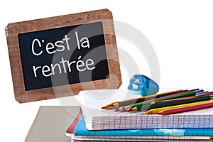 C'est la rentree (meaning Back to school) written on black chalkboard photo