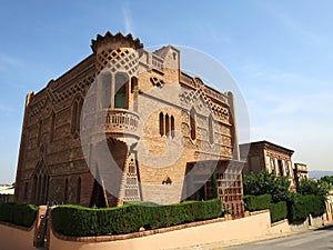 The Ca L'Espinal (Esponal's house) in Colonia Guell, Barcelona, SPAIN photo