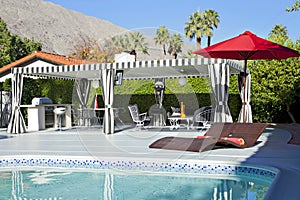 Cabana at poolside in luxury mansion photo