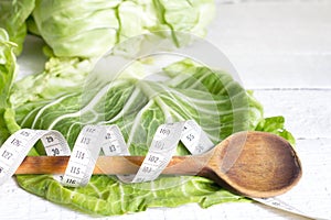 Cabbage diet concept healthy lifestyle with centimeter photo