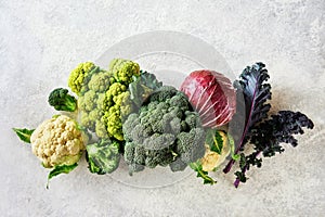 Cabbage of different varieties on a light background