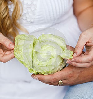 Cabbage is in the hands.