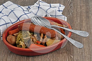 Cabbage hotpot in a dish with cutlery close-up