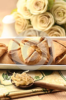 Cabbage pie, roses in the background