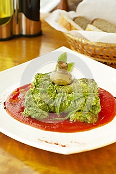 Cabbage rolls with mushrooms in tomato sauce