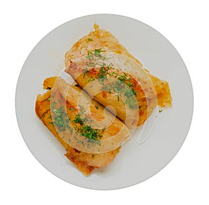 Cabbage rolls on a plate isolated on a white