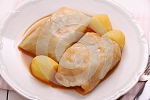 Cabbage rolls with potato and sauce