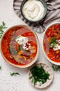 Cabbage rolls soup in a ceramic bowl on a table. .style hugge
