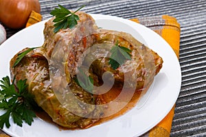 Cabbage rolls on a wooden gray rustic background