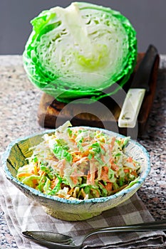 Cabbage salad cole slaw in a ceramic bowl