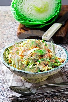 Cabbage salad cole slaw in a ceramic bowl