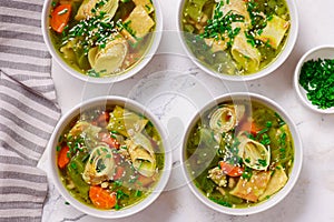 Cabbage soup with eggs roll in a ceramic bowl on a table. .style hugge