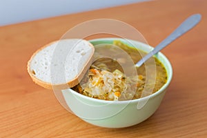 Cabbage soup knwos in Poland as kapusniak with bread.