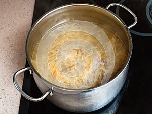 Cabbage soup with stewed sauerkraut in stewpan