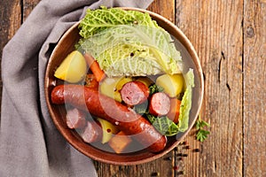 Cabbage, vegetable, sausage and broth