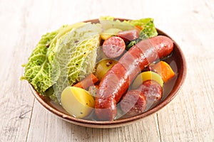 Cabbage, vegetable, sausage and broth