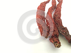 Cabe Kering or Dry Red chili. is a condiment that adds pungency and color to the food photo