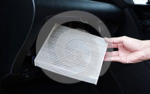 Cabin Air Filter Replacement, Air filter in the cabin that is dirty after use for a while. Automotive air conditioning, check dust photo