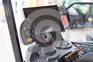 The cabin and control stick tractor of a modern tractor