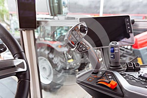 The cabin and control stick tractor of a modern tractor