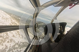 Cabin helicopter view of the snowy mountains freeride heliski photo