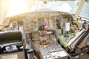 Cabin pilots aircraft view of the windshield, steering wheels, control devices.